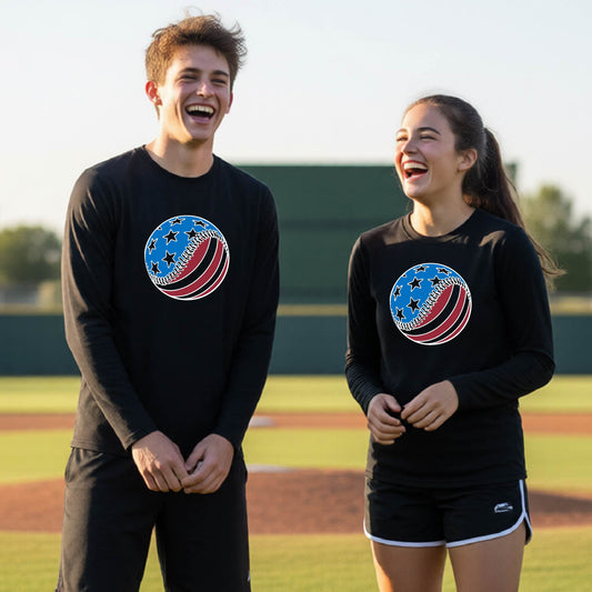 Two young athletes wearing matching black t-shirts smiling in front of a baseball diamond  with a colored graphic of an American flag patriotic baseball with stars and stripes printed on the front of the shirts.