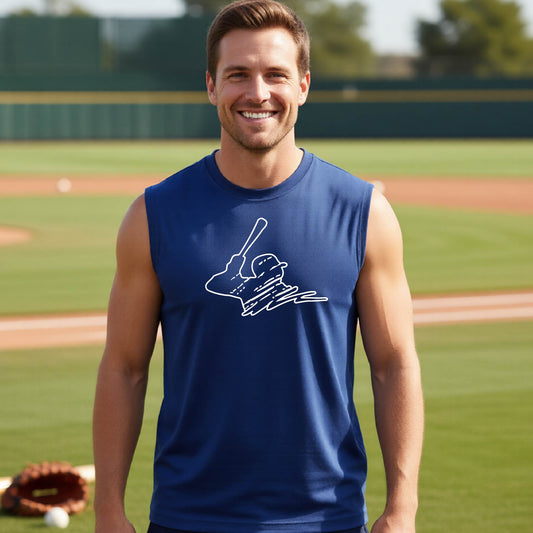 A man smiling in front of a baseball diamond wearing a blue sleeveless t-shirt, with a white graphic of an outline of a baseball player up to bat, printed on the front.