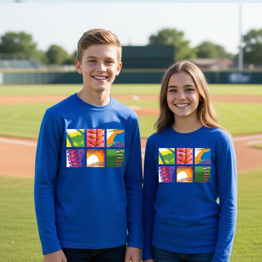 Two youth athletes wearing matching shirts, smiling in front of a baseball diamond wearing royal blue long-sleeve t-shirts with a colorful grid graphic or 2x3 baseball squares of a baseball, printed on the front.