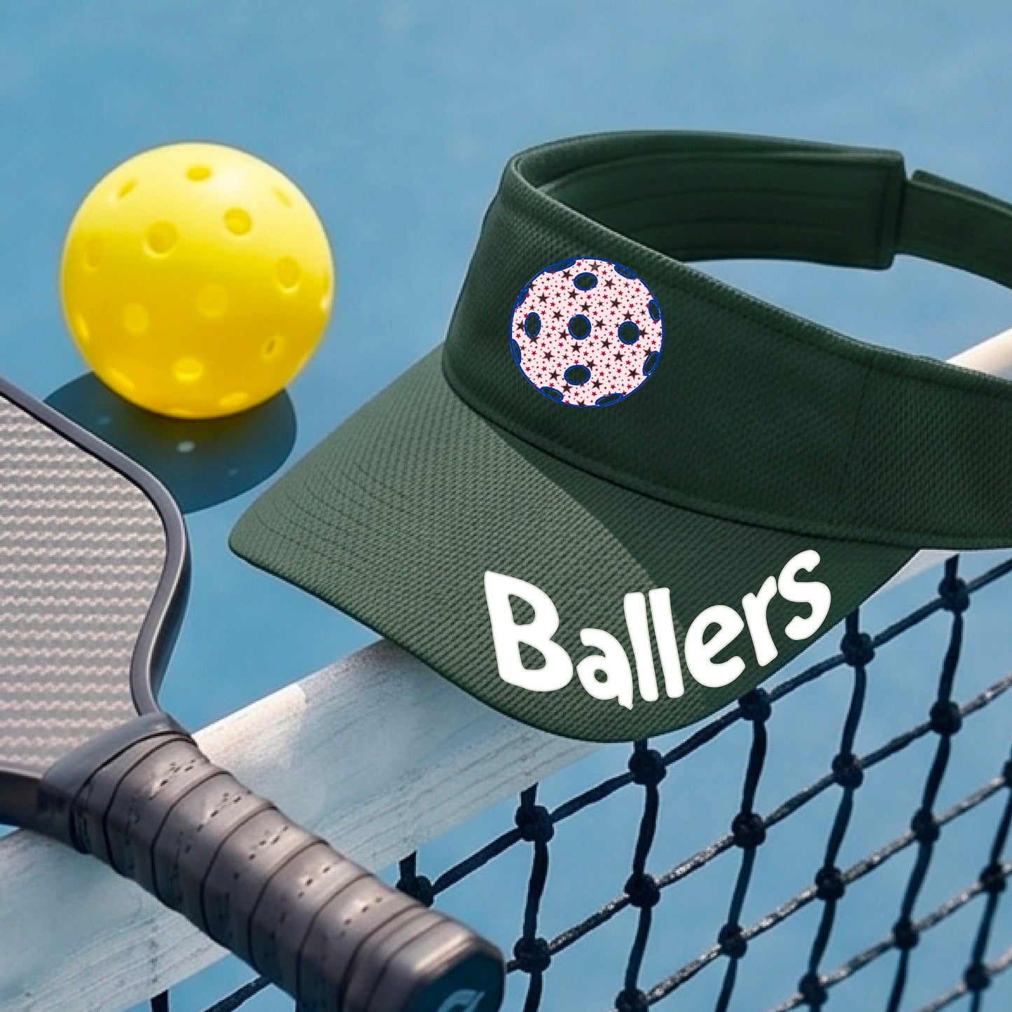 A close up of a green visor with pickleball graphic and the word 'Ballers' in white,.