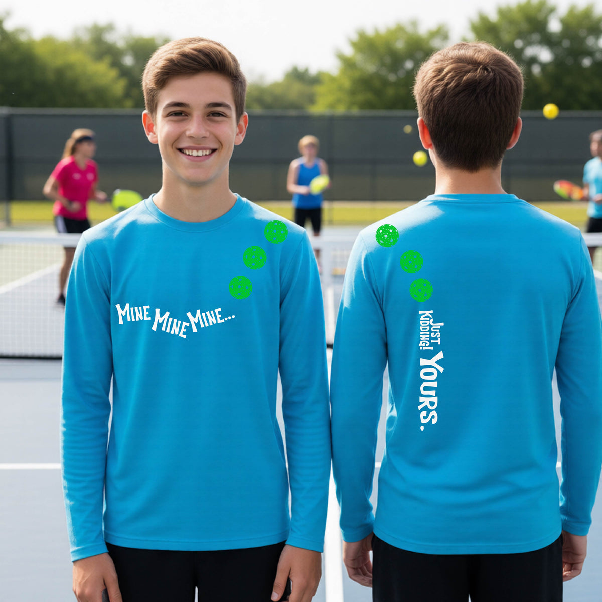 Two teenagers on a pickleball court wearing matching bright blue athletic tank tops  One shows the front with the text 'MINE MINE MINE' along with three pickleball graphics. and the back text 'JUST KIDDING YOURS, along with three pickleball graphics.