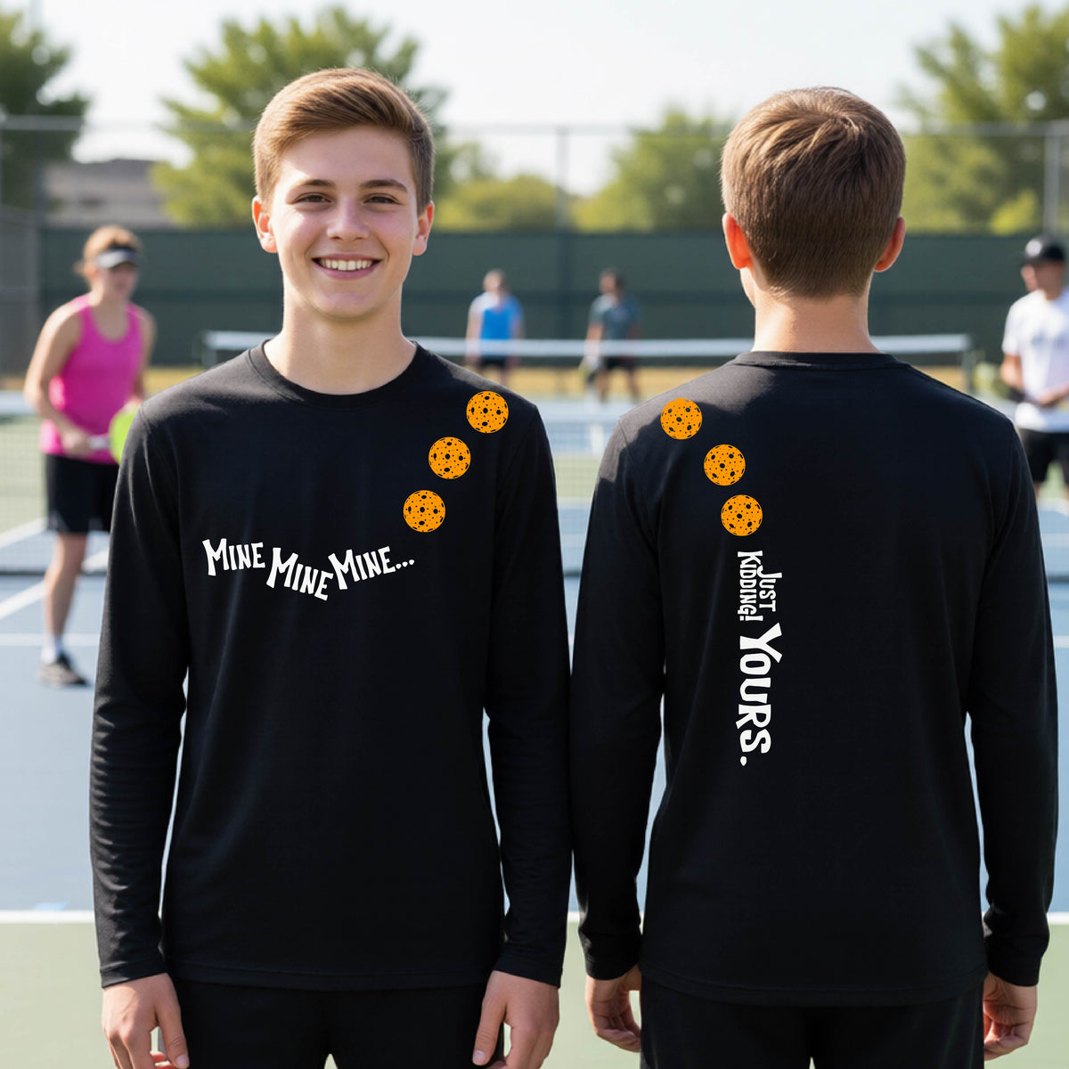 Two teenagers on a pickleball court wearing matching black athletic tank tops  One shows the front with the text 'MINE MINE MINE' along with three pickleball graphics. and the back text 'JUST KIDDING YOURS, along with three pickleball graphics.