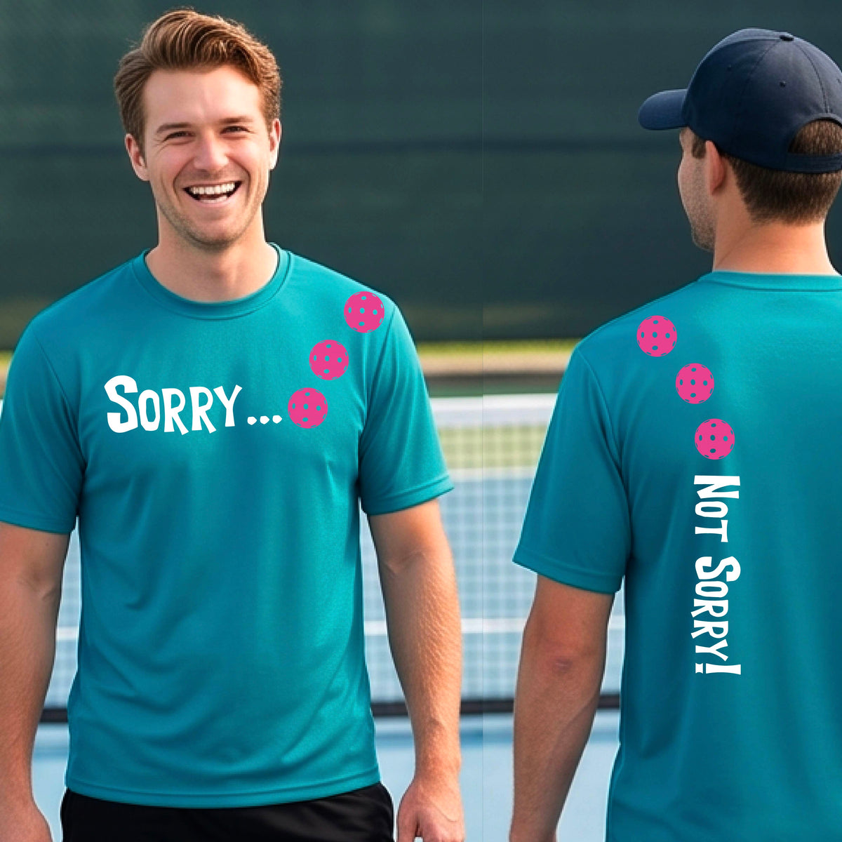 Two men on a pickleball court wearing teal short-sleeve t-shirts with a front/back graphic design.  The front features the playful word “SORRY…” in bold white lettering, accented with three colorful pickleballs arranged diagonally across the upper chest.  The back design features “NOT SORRY!” in bold white lettering running vertically down the upper back, with three matching colorful pickleballs positioned above lettering. 