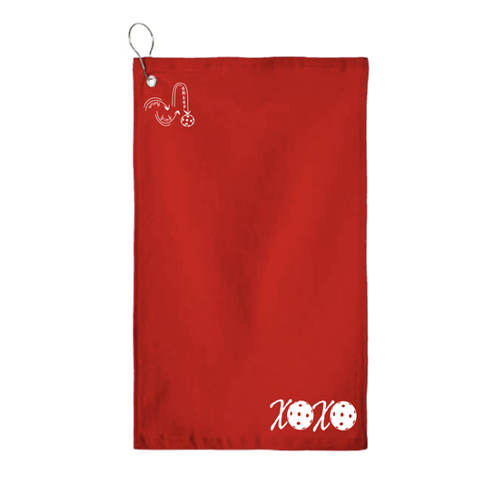 This XOXO pickleball towel is crafted with cotton terry velour for optimal performance. It features grommets, hooks, and hemmed edges for added durability. It's perfect for completing your pickleball gear, and an ideal gift for friends and tournaments. The towel is designed to be both absorbent and lightweight, so you can remain dry and comfortable while you play.
