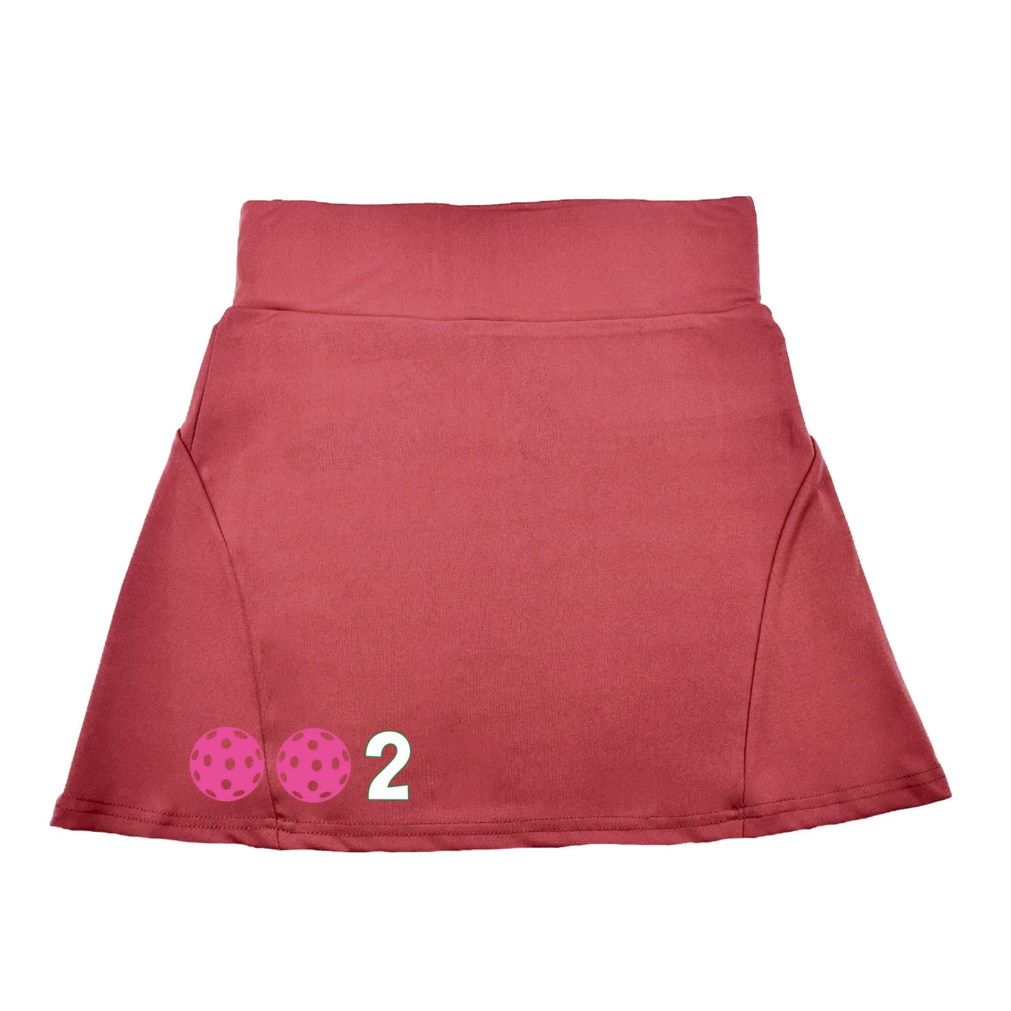 Pickleball Flirty Skort Design: 002 Customizable Pickleball Ball color:  Choose: White - Green -Yellow or Pink.  These flirty skorts have a flat mid-rise waistband with a 3 inch waistband.  Light weight without being see through and the material wicks away moisture quickly.  Flirty pleats in the back with inner shorts for free movement and stylish coverage on the courts.  A functional zipper pocket on the back and two built in pockets on the shorts for convenient storage. 