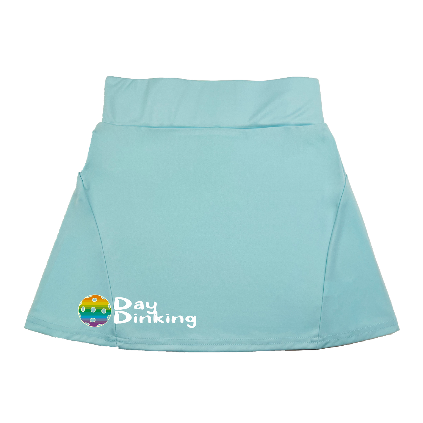 Pickleball Flirty Skort in Cyan, Purple or Rainbow.  These flirty skorts have a flat mid-rise waistband with a 3-inch waistband.  Light weight without being see through and the material wicks away moisture quickly.  Flirty pleats in the back with inner shorts for free movement and stylish coverage on the courts.  A functional zipper pocket on the back and two built in pockets on the shorts for convenient storage. The rear pleats are what make these skorts fabulous!  