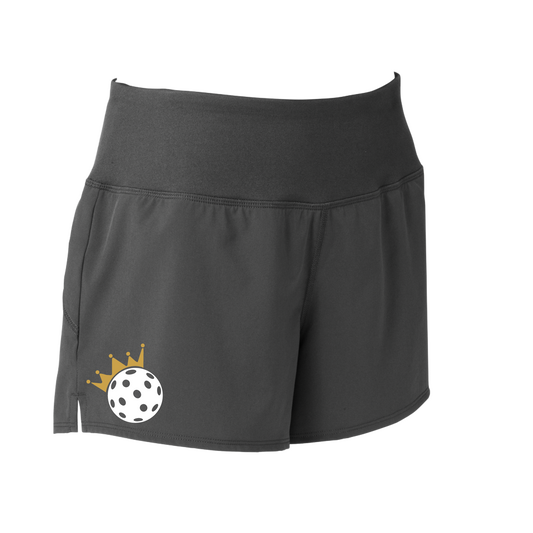 The Pickleball Queen and Crown Shorts are designed to offer women the ultimate in versatility, comfort, and security. With an exterior cell phone pocket on the waistband and a removable tag for extra comfort, you can transition from the court to your day-to-day activities with ease. Additionally, thanks to the 3 1/2" inseam, the shorts won't ride up no matter how physically demanding the pickleball game.