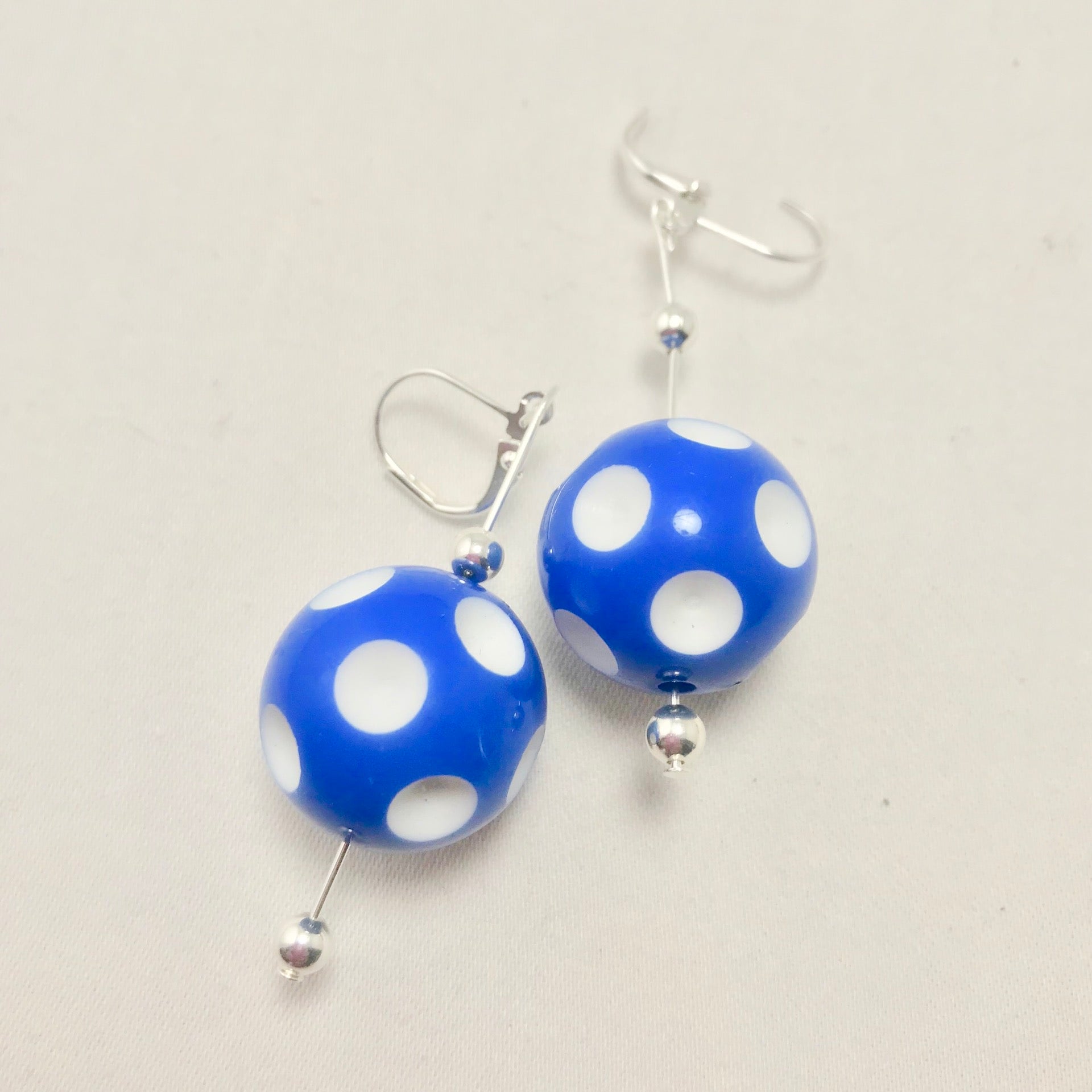 Mini Pickleball Dangling Earrings - Eight Colors to Choose From  Super cute pickleball beads made into dangle earrings. They hang approximately an 2 and a half inches down. The beads are approximately 1/2 an inch in width.  Show your love for pickleball wherever you go with these super sweet earrings. Colors to match any outfit!! 