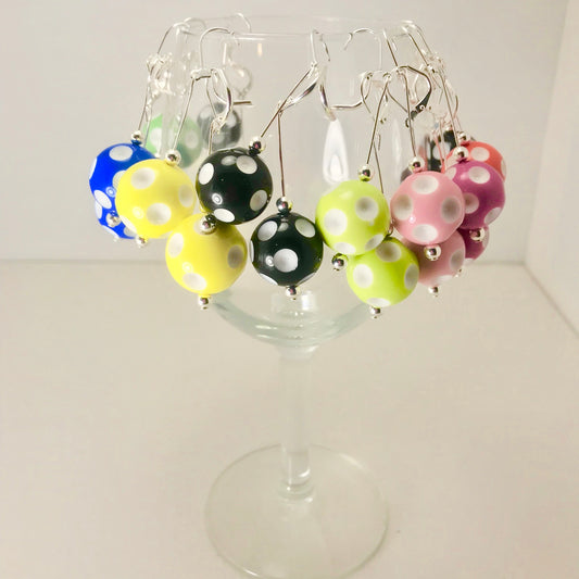 Mini Pickleball Dangling Earrings - Eight Colors to Choose From  Super cute pickleball beads made into dangle earrings. They hang approximately an 2 and a half inches down. The beads are approximately 1/2 an inch in width.  Show your love for pickleball wherever you go with these super sweet earrings. Colors to match any outfit!! 