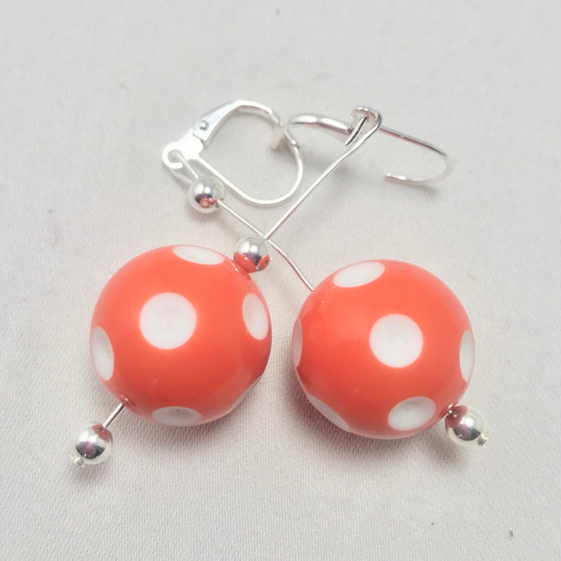 Mini Pickleball Dangling Earrings - Eight Colors to Choose From  Super cute pickleball beads made into dangle earrings. They hang approximately an 2 and a half inches down. The beads are approximately 1/2 an inch in width.  Show your love for pickleball wherever you go with these super sweet earrings. Colors to match any outfit!! 