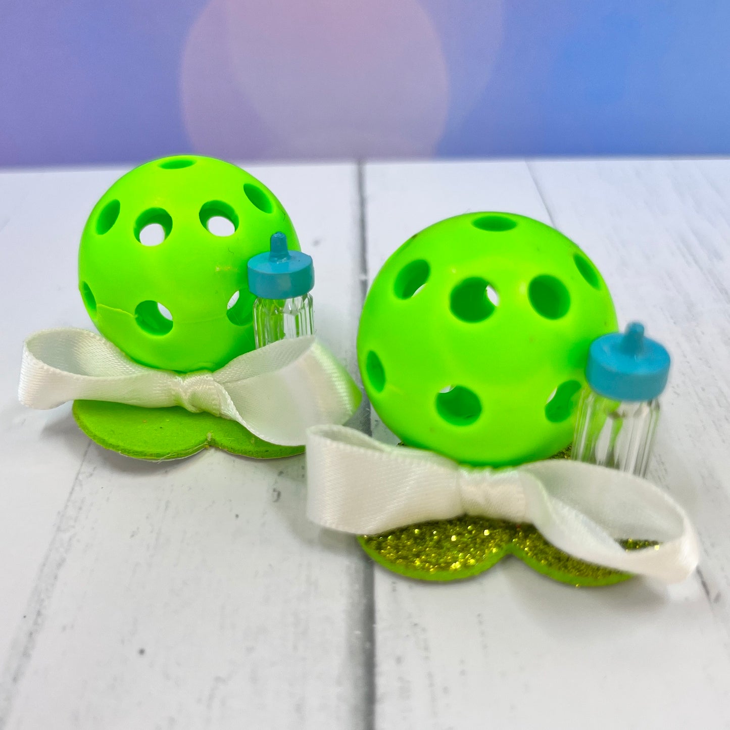 Pickleball Ball Ornaments - Set of 2 Upcycled Pickleball Ornaments  Pickleball Christmas all year! It’s 2020, so why not? Perfect as a gift for yourself or others. It takes up very little space for all the RV pickleballers out there. This set of 2 upcycled pickleball ornaments can be hung in the doorway or used as a Christmas tree ornament. The pickleballs are adorned with fun tassels and one has a poinsettia and the other has a snowflake.