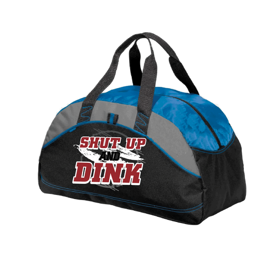Pickleball Duffel bAg Design: Shut Up and Dink  Carry your gear in comfort and style. This fun pickleball duffel bag is the perfect accessory for all pickleball players needing to keep their gear in one place. This medium sized duffel tote is ideal for all your pickleball activities. The large center compartment allows for plenty of space and the mesh end pocket is perfect for holding a water bottle.