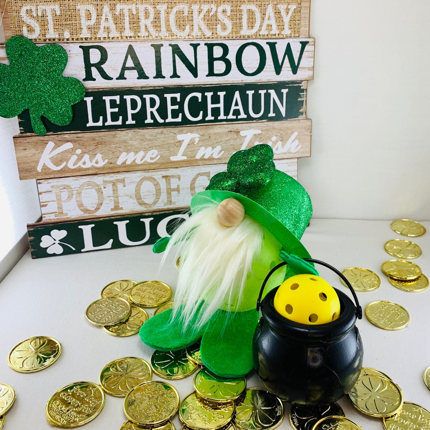LUCKY THE ST. PATRICK'S DAY PICKLEBALL GNOME FOR THE IRISH HOLIDAY SEASON - DECORATION OR GIFT  These pickleball gnomes are perfect for decoration or gifts for your pickleball addicted friends. Each Pickleball Gnome's body is an upcycled full-sized pickleball and comes with its own pickleball pot of gold!! You will also get 5 gold coins with each gnome!! These Gnomes are the perfect gifts for all you pickleball lovers in your life!! Adding a Pickleball Gnome to your house only makes it better.