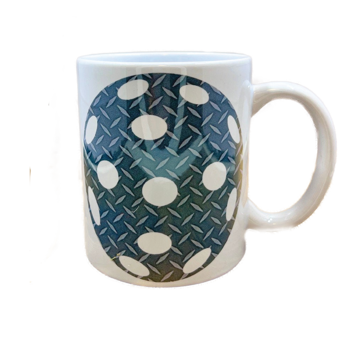 Pickleball on Coffee Mug  Greetings! What you see here is a listing for a mug that has a large pickleball on it. It comes with 1 of 4 colors for the pickleballs (Diamond plate, Harringbone pattern, Pink, and Galactic). Design is printed around the whole mug.  This is a high-quality, white, 12 oz, ceramic mug. For the longevity of the mug, hand wash only.