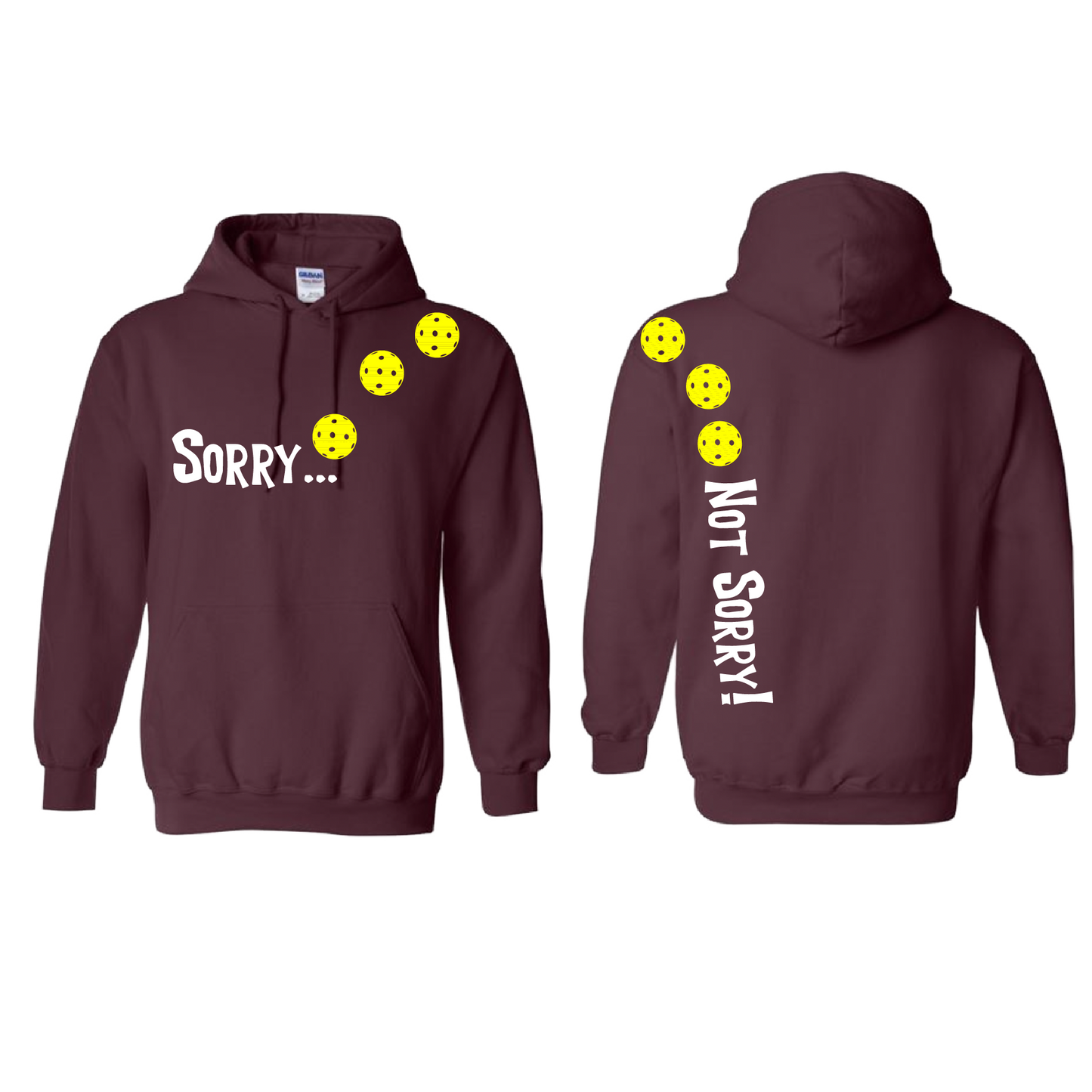 Pickleball Design: Sorry...Not Sorry!!! with Customizable Ball Color – White, Green, Yellow or Pink Balls. Unisex Hooded Sweatshirt: Moisture-wicking, double-lined hood, front pouch pocket. This unisex hooded sweatshirt is comfortable and soft. Stay warm on the Pickleball courts while being that hit with this one of kind design.