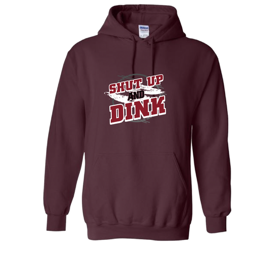 Pickleball Design: Shut Up and Dink  Unisex Hooded Sweatshirt: Moisture-wicking, double-lined hood, front pouch pocket.  This unisex hooded sweatshirt is ultra comfortable and soft. Stay warm on the Pickleball courts while being that hit with this one of kind design.
