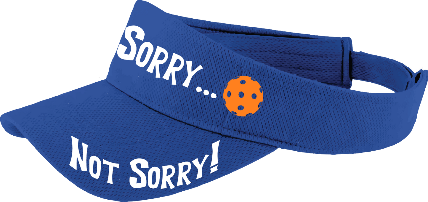 Pcikleball Visor Design: Sorry...Not Sorry!!!  Customizable Ball Color in eight colors  This fun pickleball visor is the perfect accessory for all pickleball players needing to keep their focus on the game and not the sun. The moisture-wicking material is made of 100% polyester with closed-hole flat back mesh and PosiCharge Technology. The back closure is a hook and loop style made to adjust to every adult.