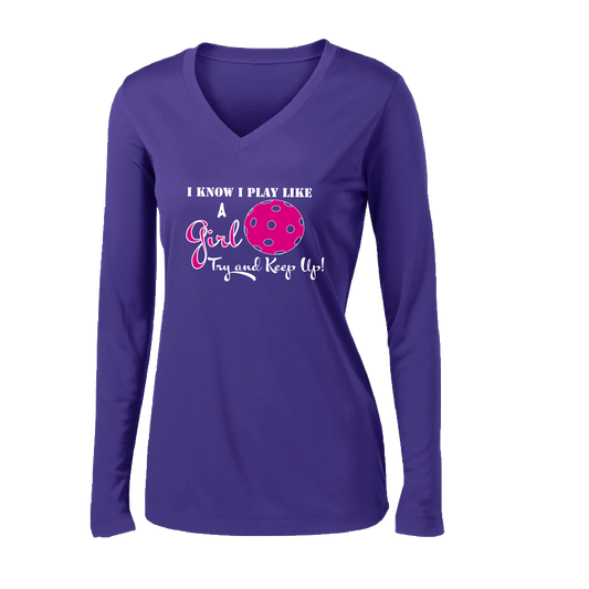 Pickleball Design: I know I Play Like a Girl, Try to Keep Up -  Women's Style: Long Sleeve V-Neck  Turn up the volume in this Women's shirt with its perfect mix of softness and attitude. Material is ultra-comfortable with moisture wicking properties and tri-blend softness. PosiCharge technology locks in color. Highly breathable and lightweight.