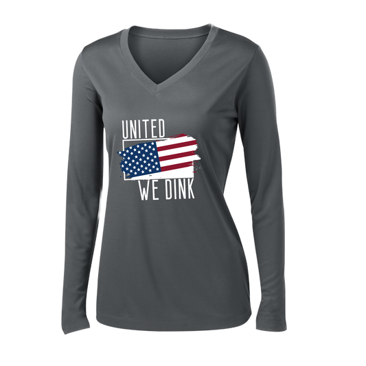 Pickleball Design: United We Dink.   Women's Styles: Long-Sleeve V-Neck  Turn up the volume in this Women's shirt with its perfect mix of softness and attitude. Material is ultra-comfortable with moisture wicking properties and tri-blend softness. PosiCharge technology locks in color. Highly breathable and lightweight.