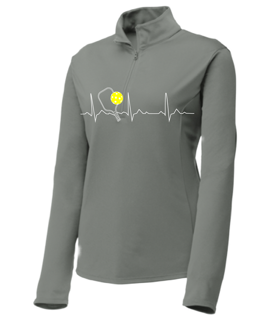 Pickleball Design: Heartbeat Customizable Location  Women's 1/4-Zip Pullover: Princess seams and drop tail hem.  Turn up the volume in this Women's shirt with its perfect mix of softness and attitude. Material is ultra-comfortable with moisture wicking properties and tri-blend softness. PosiCharge technology locks in color. Highly breathable and lightweight. Versatile enough for wearing year-round.