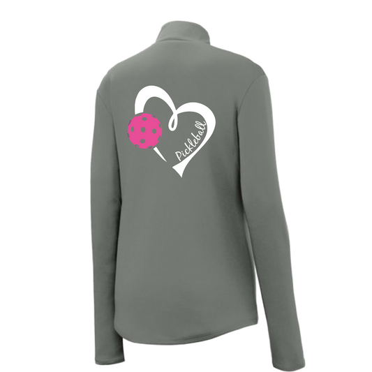 Pickleball Design: Heart with Pickleball  Women's 1/4-Zip Pullover:  Princess seams and drop tail hem.  Turn up the volume in this Women's shirt with its perfect mix of softness and attitude. Material is ultra-comfortable with moisture wicking properties and tri-blend softness. PosiCharge technology locks in color. Highly breathable and lightweight. Versatile enough for wearing year-round.