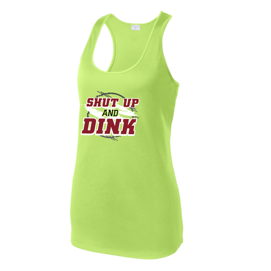 Pickleball Design: Shut up and Dink  Women's Styles: Racerback Tank  Turn up the volume in this Women's shirt with its perfect mix of softness and attitude. Material is ultra-comfortable with moisture wicking properties and tri-blend softness. PosiCharge technology locks in color. Highly breathable and lightweight.