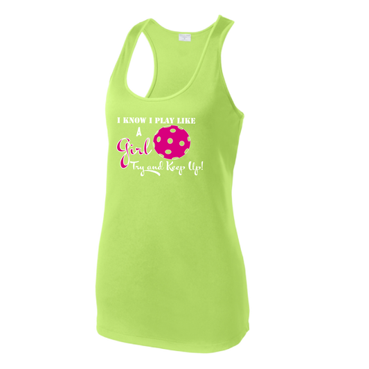 Pickleball Design: I know I Play Like a Girl, Try to Keep Up -  Women's Style: Racerback Tank  Turn up the volume in this Women's shirt with its perfect mix of softness and attitude. Material is ultra-comfortable with moisture wicking properties and tri-blend softness. PosiCharge technology locks in color. Highly breathable and lightweight.