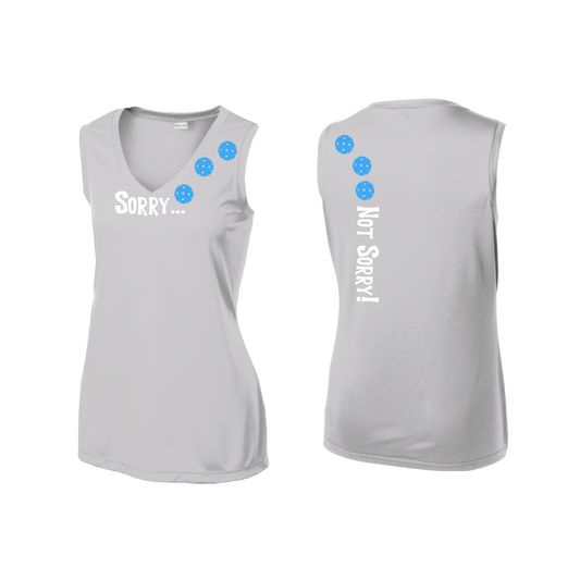 Pickleball Design: Sorry...Not Sorry with Customizable Ball Color - Choose: Cyan, Orange, Purple or Rainbow.   Women's Styles: Sleeveless Tank Turn up the volume in this Women's shirt with its perfect mix of softness and attitude. Material is ultra-comfortable with moisture wicking properties and tri-blend softness. PosiCharge technology locks in color. Highly breathable and lightweight.