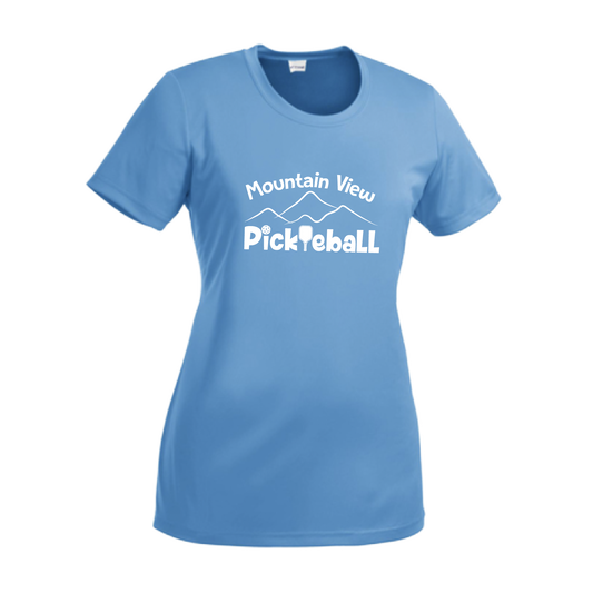Pickleball Design: Mountain View Pickleball Club  Women's Style: Short-Sleeve Crew-Neck  Turn up the volume in this Women's shirt with its perfect mix of softness and attitude. Material is ultra-comfortable with moisture wicking properties and tri-blend softness. PosiCharge technology locks in color. Highly breathable and lightweight.