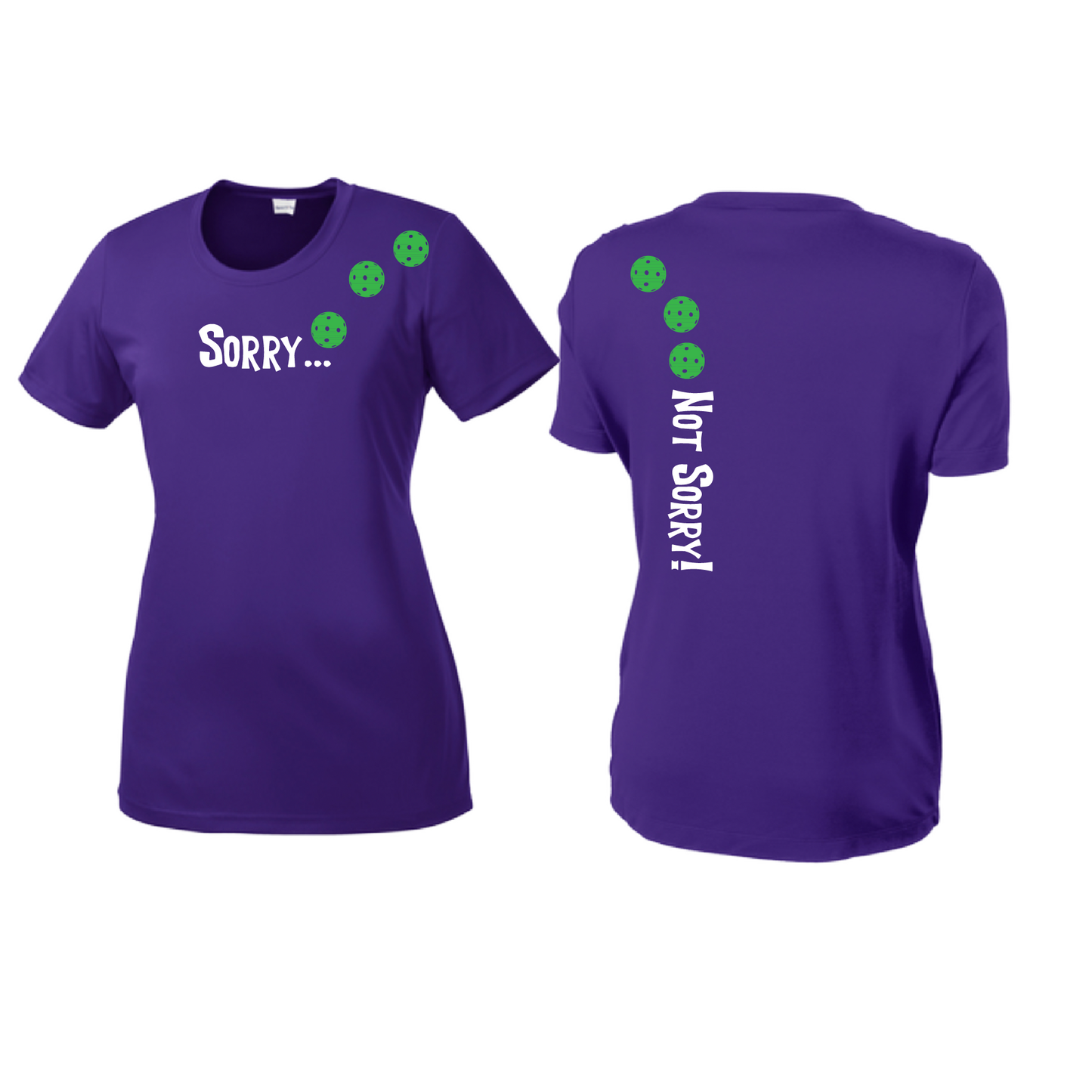 Pickleball Design: Sorry...Not Sorry with Customizable Ball Color - Choose: Orange, Green or Purple.   Women's Styles: Short-Sleeve Crew Neck Turn up the volume in this Women's shirt with its perfect mix of softness and attitude. Material is ultra-comfortable with moisture wicking properties and tri-blend softness. PosiCharge technology locks in color. Highly breathable and lightweight.