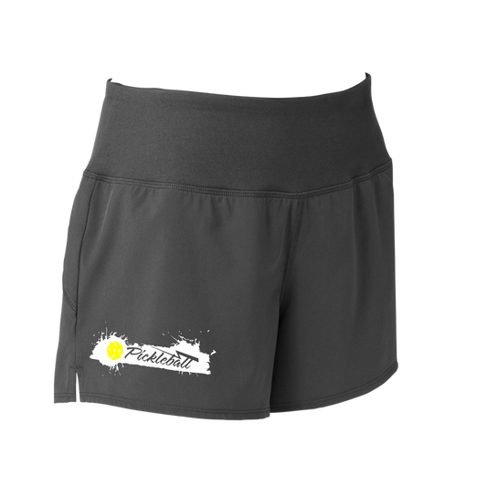 Pickleball Designs: Extreme Pickleball  Sport Tek women’s repeat shorts come with built-in cell phone pocket on the exterior of the waistband. You can also feel secure knowing that no matter how strenuous the exercise, the shorts will remain in place (it won’t ride up!). These shorts are extremely versatile and trendy. Transition from the Pickleball court to running errands smoothly.