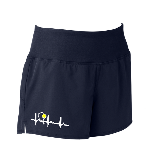 Pickleball Designs: Pickleball Heartbeat  Sport Tek women’s repeat shorts come with built-in cell phone pocket on the exterior of the waistband. You can also feel secure knowing that no matter how strenuous the exercise, the shorts will remain in place (it won’t ride up!). These shorts are extremely versatile and trendy. Transition from the Pickleball court to running errands smoothly.