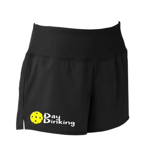 Shorts Designs: Day Dinking with Customizable Pickleball Color (Purple, Rainbow, White, & Yellow).  Sport Tek women’s repeat shorts come with built-in cell phone pocket on the exterior of the waistband. You can also feel secure knowing that no matter how strenuous the exercise, the shorts will remain in place (it won’t ride up!). These shorts are extremely versatile and trendy. Transition from the Pickleball court to running errands smoothly.