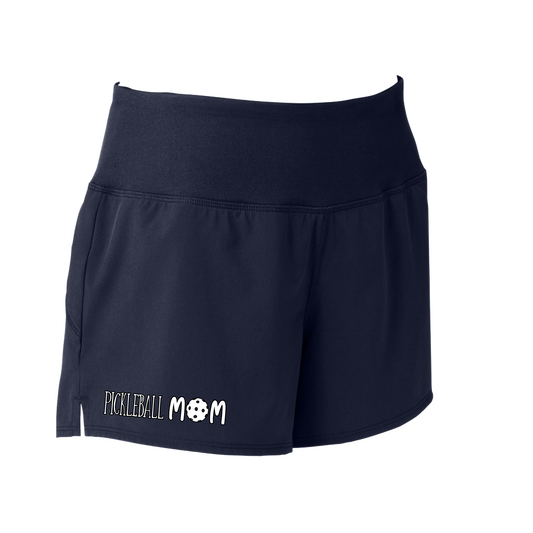 Pickleball Shorts Design: Pickleball Mom  Sport Tek women’s repeat shorts come with built-in cell phone pocket on the exterior of the waistband. You can also feel secure knowing that no matter how strenuous the exercise, the shorts will remain in place (it won’t ride up!). These shorts are extremely versatile and trendy. Transition from the Pickleball court to running errands smoothly.