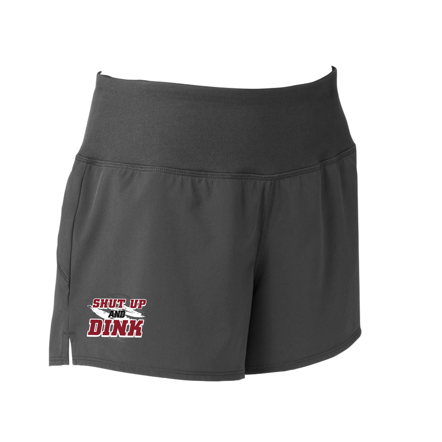 Pickleball Short Design: Shut Up and Dink  Sport Tek women’s repeat shorts come with built-in cell phone pocket on the exterior of the waistband. You can also feel secure knowing that no matter how strenuous the exercise, the shorts will remain in place (it won’t ride up!). These shorts are extremely versatile and trendy. Transition from the Pickleball court to running errands smoothly.