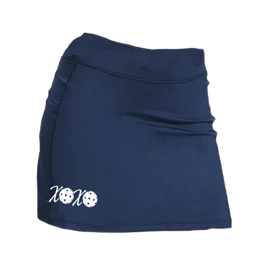 Pickleball Skort Design: XOXO  Women’s core active jersey-knit skort comes with built-in shorts made out of a poly-spandex blend that will keep your legs from rubbing together, without which often results in painful chafing. You can also feel secure knowing that no matter how strenuous the exercise, the skort will remain in place (it won’t ride up!). The fabric is breathable, featuring Dri-Works wicking technology.