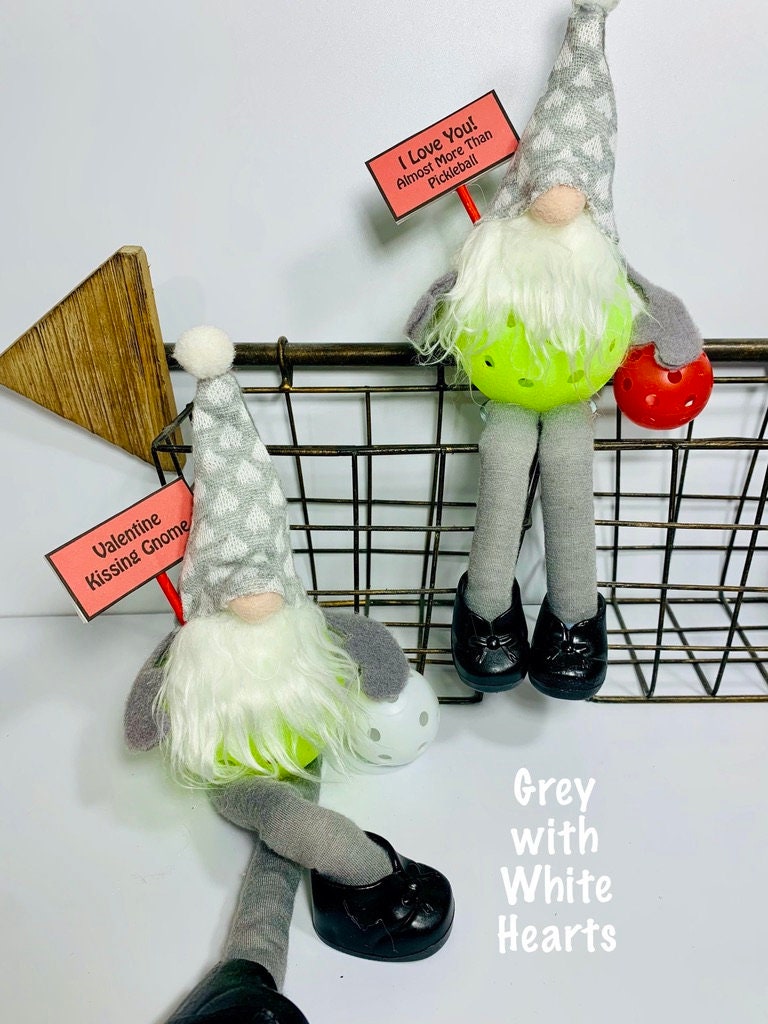 PICKLEBALL SITTING GNOME FOR THE VALENTINE'S HOLIDAY - DECORATION OR GIFT  These pint-sized pickleball gnomes are perfect for decoration or gifts for your pickleball addicted friends. Each Pickleball Gnome's body is an upcycled full-sized pickleball with a sign that you get to customize. 3 sayings available!! These Gnomes are the perfect gifts for all you pickleball lovers in your life!! Adding a Pickleball Gnome to your house only makes it better.
